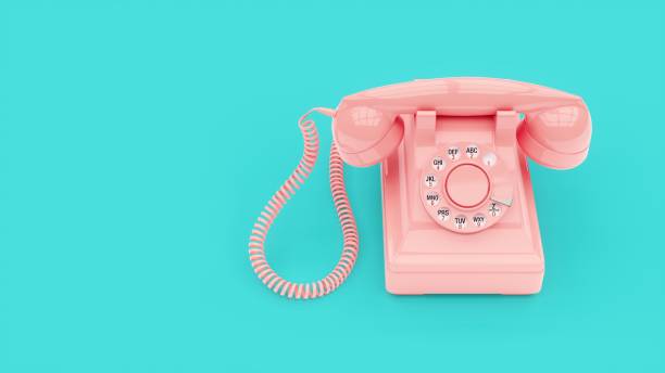istock 3D rendering Pink vintage phone isolated on Blue background 1284880783