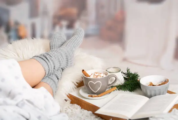 Photo of cocoa, hot chocolate, book, cosy in the wintertime