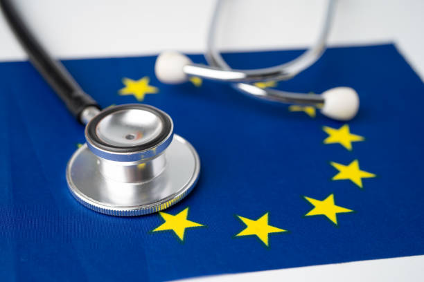 istock Black stethoscope on EU flag background, Business and finance concept. 1284882111