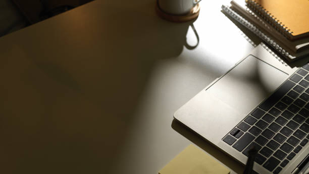 istock Workspace with laptop, supplies and copy space in office room 1284883816