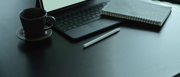 istock Worktable with digital tablet, keyboard, stylus, supplies and copy space 1284885716