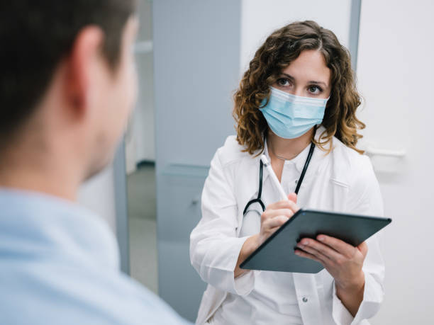 istock young doctor taking anamnesis 1284886014
