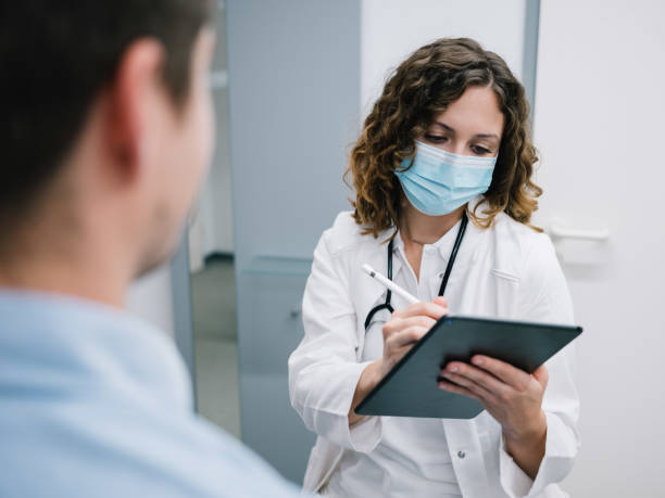 istock young doctor taking anamnesis 1284886017