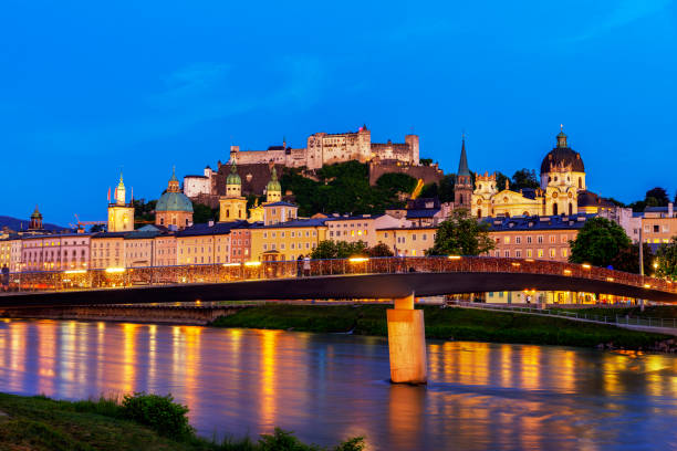 istock Old Salzburg cityscape at night 1284886119