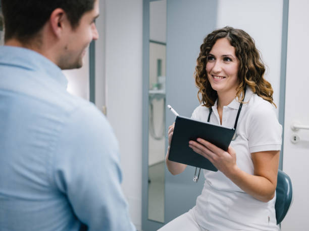 istock young doctor taking anamnesis 1284886770