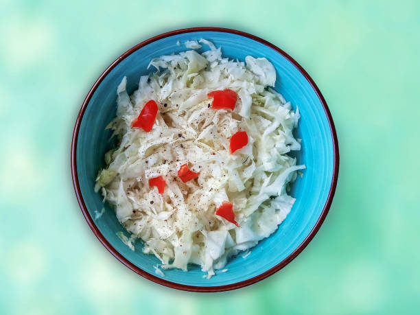 Cabbage salad with fresh hot  peppers stock photo