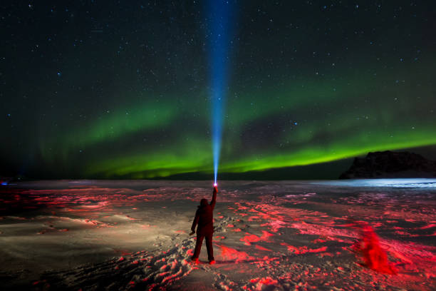 istock Crossing of lights from earth to sky 1284891346
