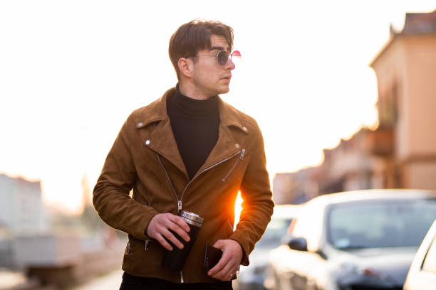 istock Handsome man getting late to job 1284893946