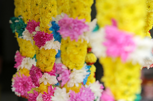 Fresh colourful garland hanging for retail display.