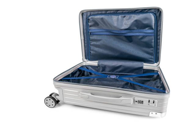 istock Luggage bag open with copy space on isolated white 1284895432