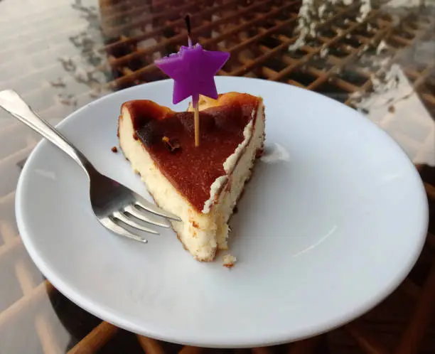 Baked slice of cheesecake called as San Sebastian, originated Spain.