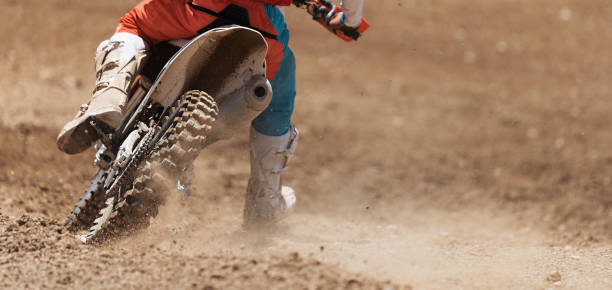 racer child on motorcycle participates in motocross race - crossing people panoramic road imagens e fotografias de stock