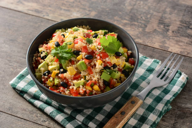 istock Mexican salad with quinoa in bowl 1284896539