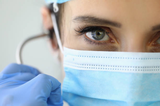 istock Confident look doctor in protective medical mask. 1284897389