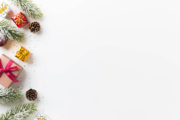 istock Christmas background with pine gift box and decoration glitter on white background. Merry christmas and Happy new year festival concept. 1284898683