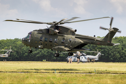British Royal Navy AW101 Merlin helicopter departing from Gilze-Rijen airbase.