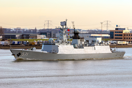 Chinese PLA Navy multi-role frigate Yuncheng (571) is leaving the Port of Rotterdam after the first visit ever of the Chinese PLA Navy to The Netherlands. Rotterdam - JAN 30, 2015:
