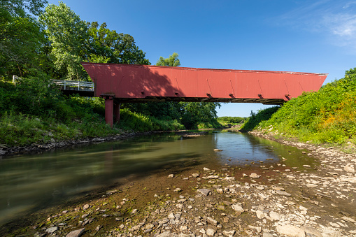 An old wooden red covered bridge.