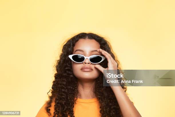 A Portrait Of Cool Teenager With White Sunglasses Stock Photo