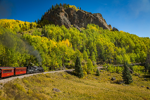 Rocky Mountains, NM / USA - September 28, 2016: Cumbres and Toltec passenger steam train scenery and views as it makes its way from Chama, New Mexico to Antonito, Colorado.