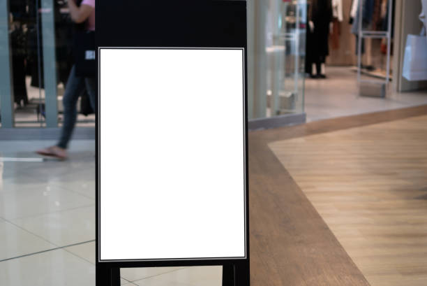 istock Blank mock up or poster sale offer menu frame advertising billboard at clothes line front department store background for show present promotion. business fashion advertisement to customer 1284909570