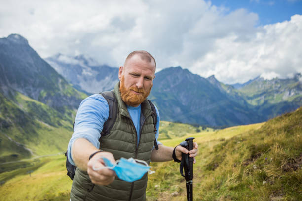 istock Corona virus precautions for a male hiker in the Austrian Alpine Mountains 1284909882