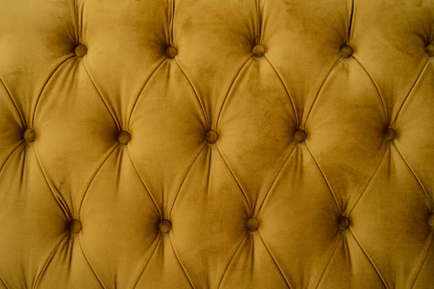 istock Cropped shot of mustard sofa 1284910966