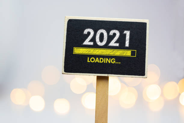 istock 2021 loading bar written in a chalkboard - New year Concept 1284912398