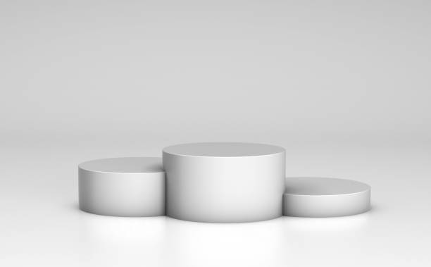 istock Empty podium, product shelf template. Gray cylinder pedestal and background. 3d render 1284912543