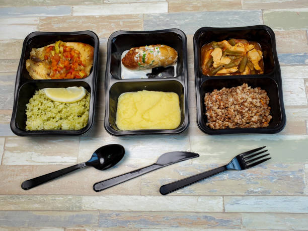 istock Various types of ready meals in disposable containers on the table 1284912770