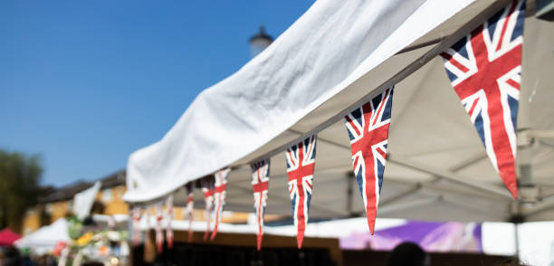 istock United Kingdom triangle flags hanging over a stand 1284913727