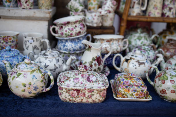 istock Porcelain objects with a floral theme in a stand 1284913743