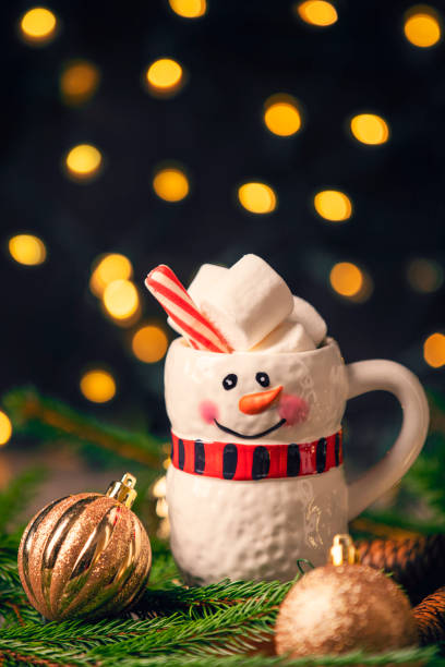 istock Cute Snowman Mug of Hot Chocolate 1284914733