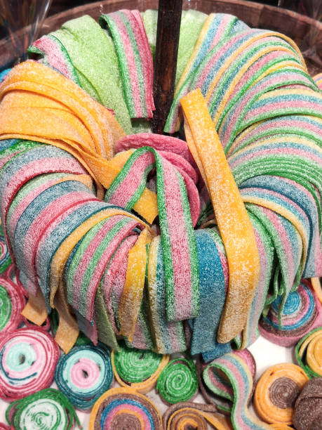 istock Colorful chewable candy plates in a supermarket or candy store 1284915591