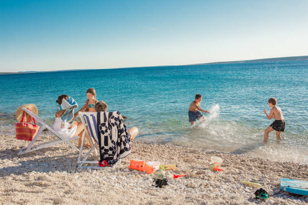 istock Family on beach in summer 1284916257