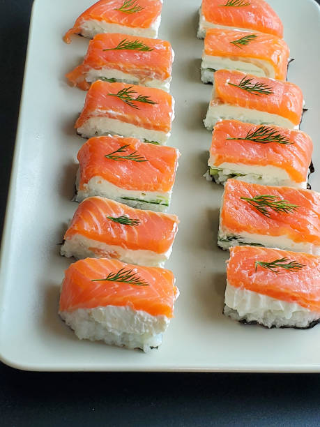 istock Sushi at home. Lazy sushi rolls are prepared at home sitting in quarantine 1284916685