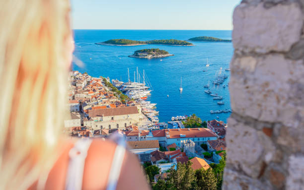 istock Woman looking at harbor 1284916691