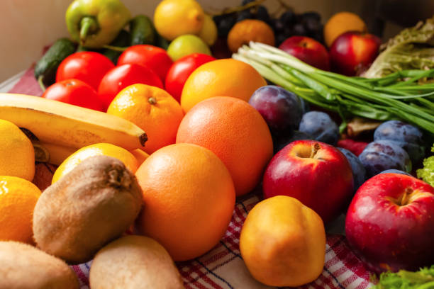 istock Fruits, vegetables and greens lie on the table, natural light 1284917890