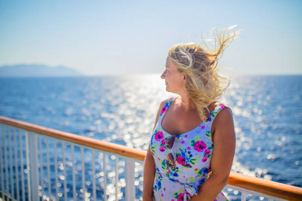 istock Woman on cruise ship 1284918303