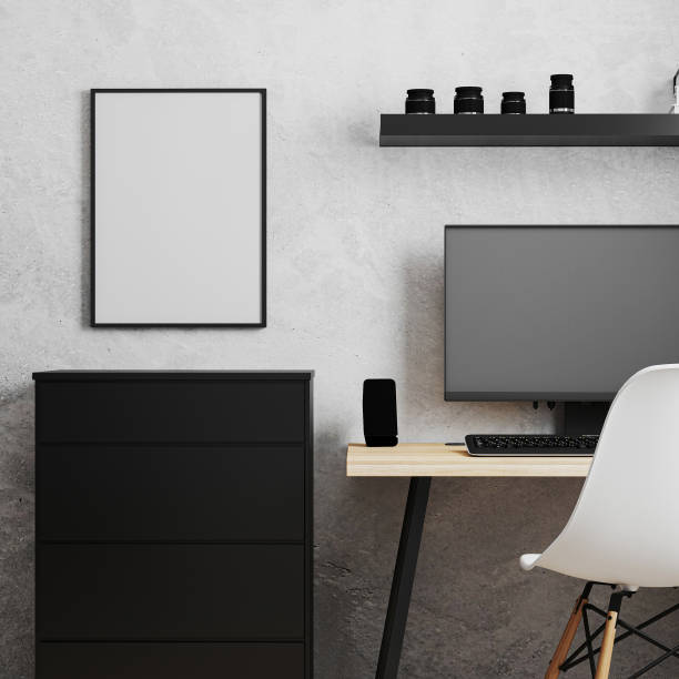 istock Blank frame near workplace with PC, wooden table and white chair, office workplace, work from home concept, 3d rendering 1284921504