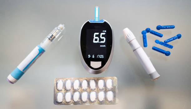 diabetes kit -blood sugar monitor to test blood sugar lancets to draw blood metformin medication insulin pen - diabetes diabetic - syringe vaccination vial insulin imagens e fotografias de stock