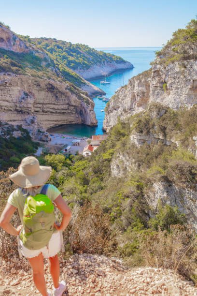 istock Woman enjoying the view on Stiniva 1284922858