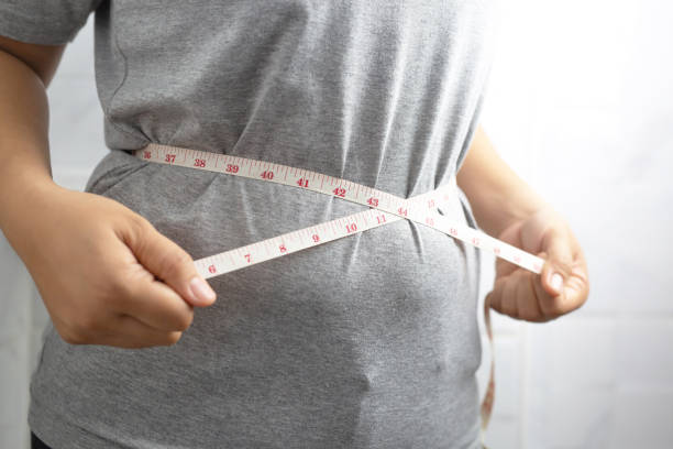 istock Obese woman needs weight control, she has excess fat. 1284922894