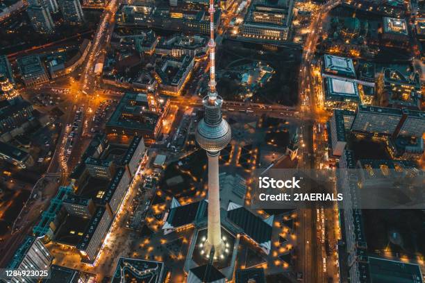 Berlin Germany Alexanderplatz Tv Tower After Sunset At Dusk With Beautiful Lit Up Streets In Orange Lights Of A Big City Cityscape Aerial View Stock Photo - Download Image Now