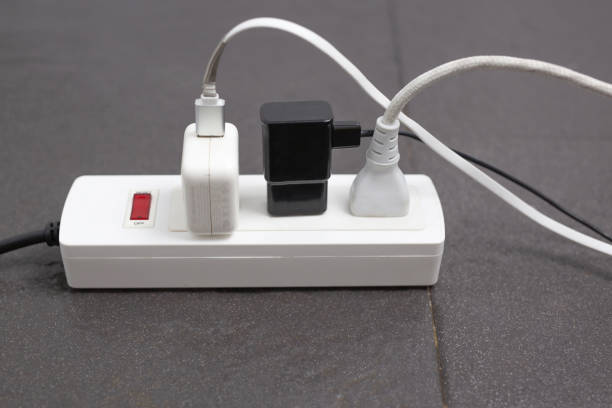 The plug and the charger must be standard and safe within the house. stock photo