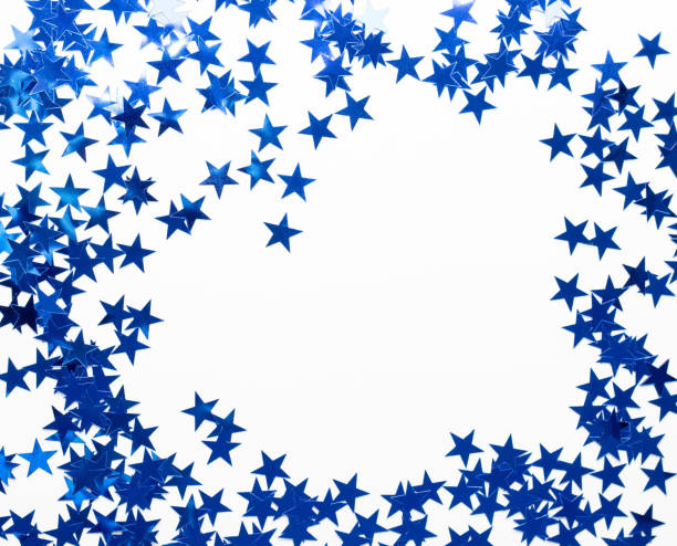 istock Christmas frame with blue star confetti. Holiday background for New Year on white 1284923890