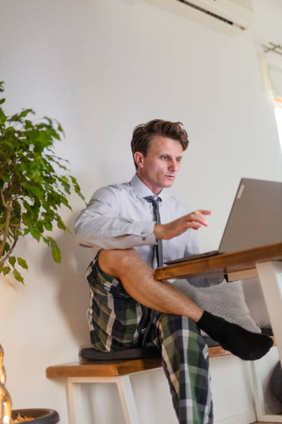 istock Businessman in quarantine working from home 1284926438