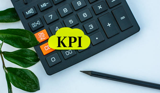 istock KPI - word on a yellow note sheet on a white background with a calculator, pencil and green sheet 1284931013