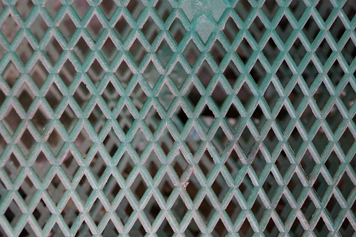 blue gray texture of long plastic bars on the lattice