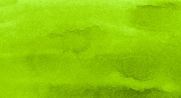 istock Vibrant green watercolor background. Lime texture on paper. Template for sites, postcards, posters. 1284933014